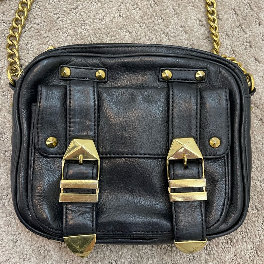 Black and gold Rebecca Minkoff crossbody